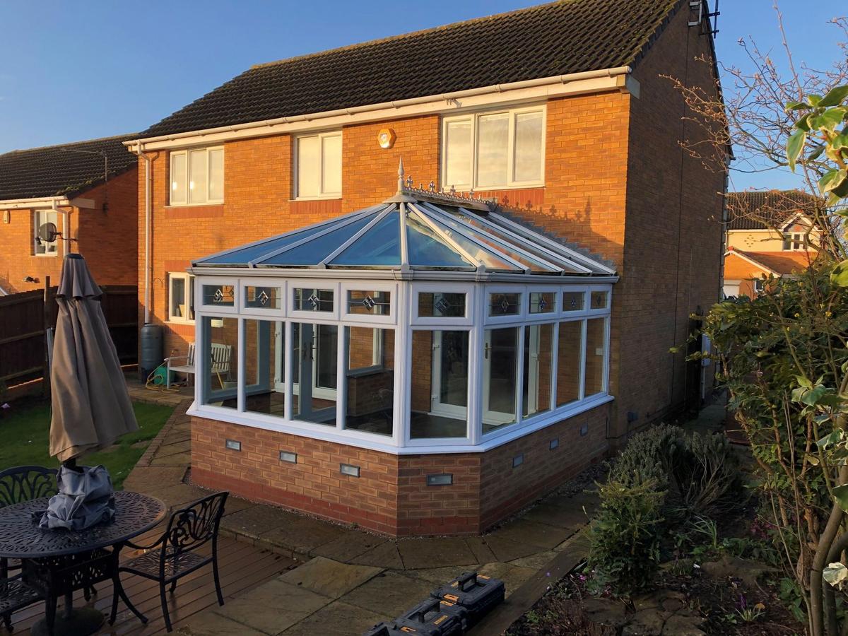 Before: glass roof replaced with a tiled roof in Pewter Grey