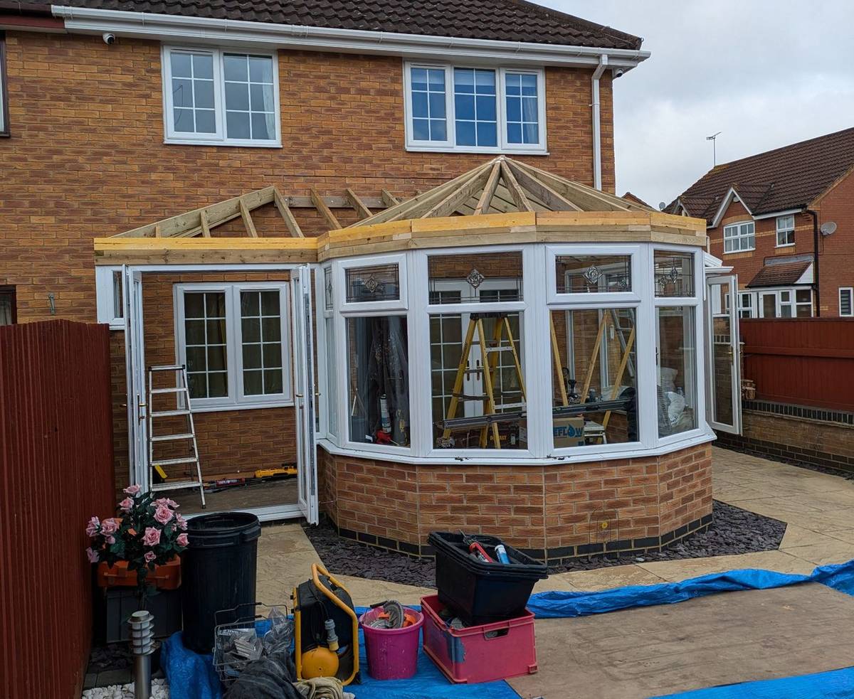 New timber frame: victorian glass roof replaced with a tiled roof in Pewter Grey