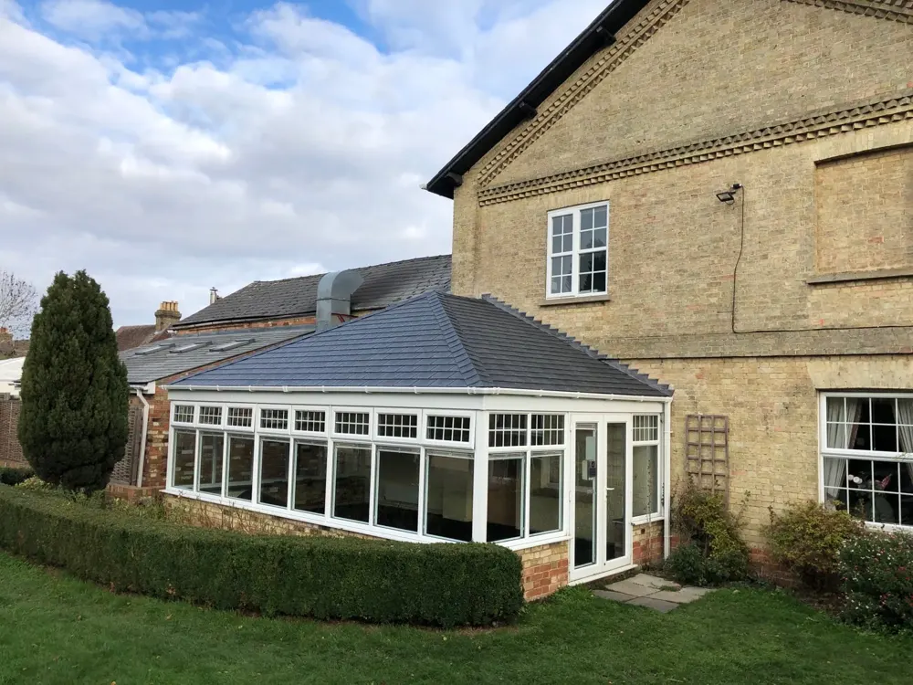 Edwardian conservatory with a tiled roof fitted by Nu-Look